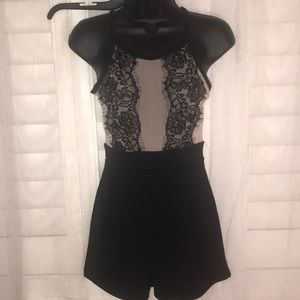 Pink lace romper, boutique never worn. No tags.